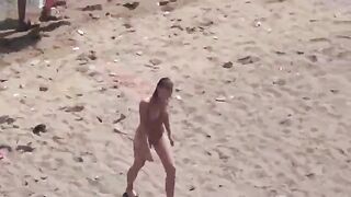A pair of naturists have fun on the ship in the sea