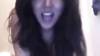 An Asian beauty gets herself off with intense pleasure in this steamy video