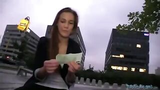 A girl is having fun with a guy right in the street