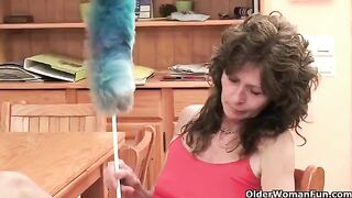 A mature woman plays with her pussy using her fingers and a toy