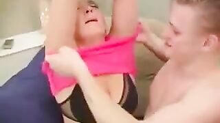 A man fucks his mom or grandma in a chair