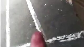A guy caressed his cock on the street and came very quickly