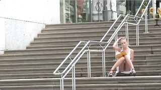 A daring girl is walking on the street without panties, and she’s doing it on purpose