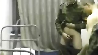 The crowd of soldiers fucked a girl in the barracks hard