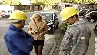 Girl in black pantyhose caresses the guy's penis during a steamy scene