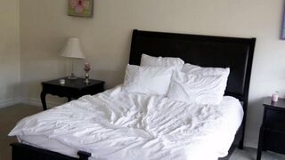 Two cute blonde girls have gentle sex on the bed, showcasing youthful passion