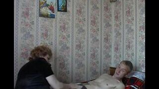A hot woman has sex with her stepson on a hidden camera