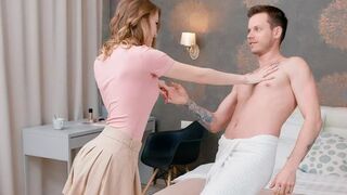 Two naked lovers have a conversation on the bed