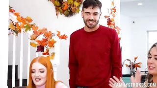 Redhead beauties share a cock in their mouths. FFM swingers