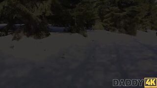 A hot chick is having fun with a man on the sled by the fireplace