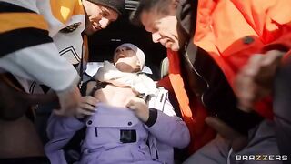 A girl was fucked by two guys in the car, like a snow angel