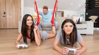 A hot girl is fucking her boyfriend in a gamer room with roommates
