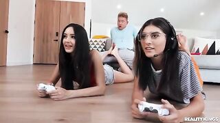 A hot girl is fucking her boyfriend in a gamer room with roommates