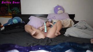The girl caresses her feet and gets pleasure from that