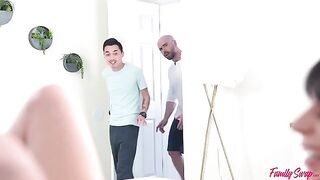 A girl is having fun with a couple of guys in a group