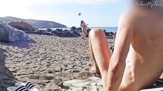 Girls almost got caught while wanking on the nude beach