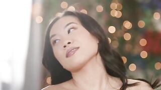 Asian chick licks her own pussy with delicate fingers