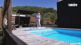 A girl is having sex with her boyfriend in the swimming pool