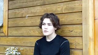 A joint was smoked by a stunning Russian brunette in the woods