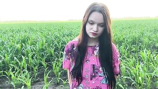 A sexy girl is having fun with her stepbrother in the cornfield