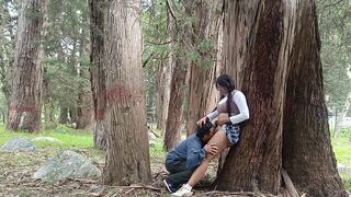 A hot girl is having fun with a man in the jungle, exploring their desires