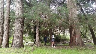 A hot girl is having fun with a man in the jungle, exploring their desires