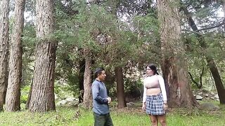A hot girl is having fun with a man in the jungle, exploring their desires