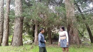 A hot girl is having fun with a man in the jungle, exploring their desires