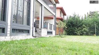 A girl is having sex with her boyfriend in the garden