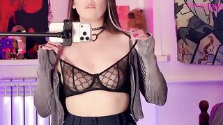 A girl caressed herself with a mirror, exploring her desires in stockings