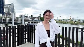 A signal of distress from a beautiful girl in a bikini, shot in HD