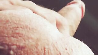 A guy masturbating with his hand on the barrel, moaning dirty talk