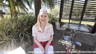 A girl with huge boobs is teasing with her tits in the kitchen