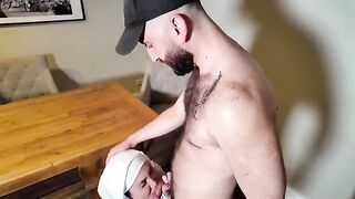 An 18-year-old girl is having fun with two muscular men at a house