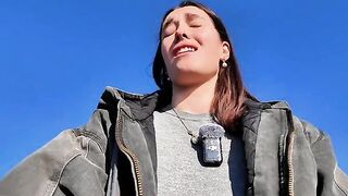 Hot petite teen masturbates outdoors on the public beach