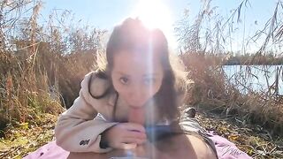 A petite girl, Mini Julia, had sex with a stranger outdoors near the lake