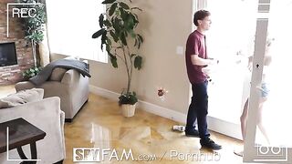A guy caught his step sister spying on him with her phone in a compromising situation